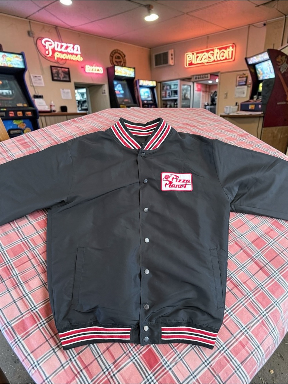 RARE Disney x Junk Food Pizza Planet Bomber Jacket Toy Story Size S Varsity